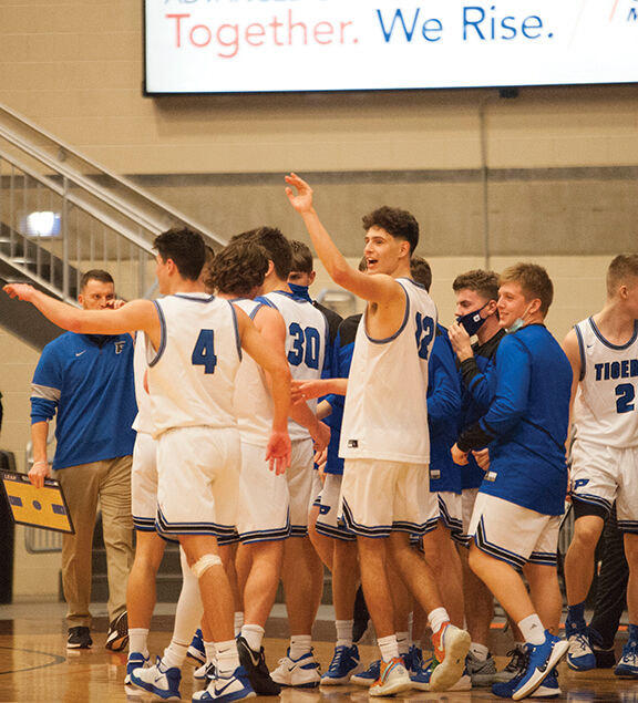 1-13 paint Colby Fugate waives goodbye to Martin County Fans.jpg